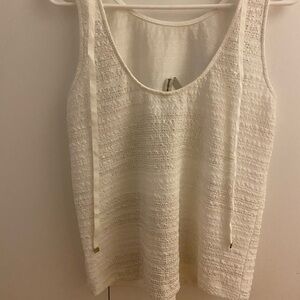 White top with gold details